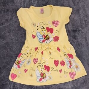 Vibrant Yellow Tiered Sundress with Flutter Cap Sleeves